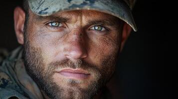 A man in a military uniform with a hat on photo