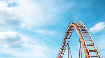 A roller coaster ride on a sunny day photo