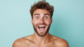 A shirtless man with a surprised expression photo