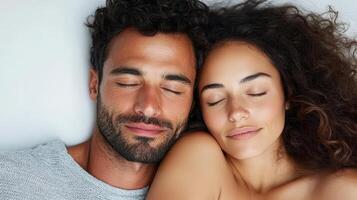 A man and woman are sleeping together photo