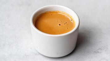 A cup of coffee on a table photo