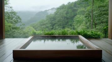 A hot tub in a wooden room with a view of the forest photo