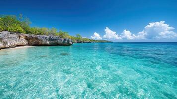 A beautiful beach with clear water and blue sky photo