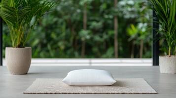 serene meditation space featuring white cushion on woven mat, surrounded by lush greenery photo