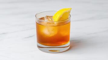Refreshing drink with ice and lemon slice, perfect for warm days photo
