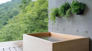 A wooden bathtub with plants on the wall photo