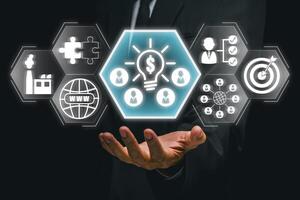 Visual representation of crowdsourcing with digital icons symbolizing teamwork, innovation, and idea sharing in business. photo