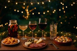 Elegant Evening Gathering With Assorted Foods and Drinks in a Beautifully Lit Outdoor Setting photo