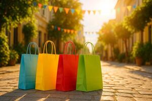 Brightly Colored Shopping Bags on a Cobblestone Street With Festive Decorations in the Late Afternoon photo