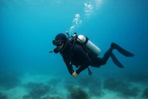 Diver Exploring Underwater Ecosystem in Clear Waters off Tropical Coast photo