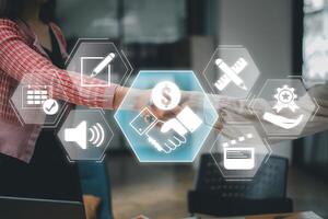 Visual representation of sponsorship with handshake and digital icons symbolizing collaboration and support. photo