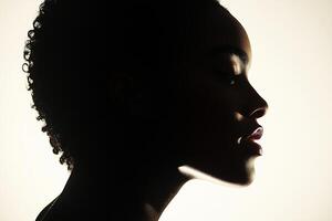 Profile Silhouette of a Woman Against a Light Background Highlighting Her Features and Curves photo
