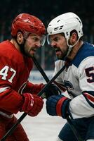 Intense Hockey Players Battling for Puck Control During a Competitive Match in a Packed Arena photo