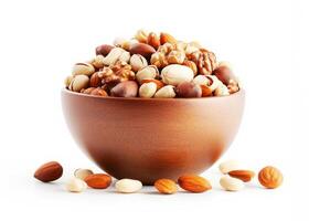 Nutty mix in wooden bowl isolated on white background photo