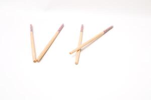 Arrangement of chopsticks showing a fun pattern against clean white background photo