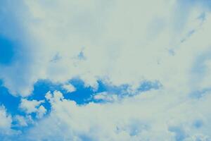 Serene View of White Clouds Floating in the Azure Blue Sky photo
