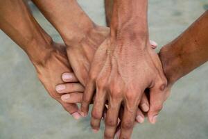 Interlocking Hands Symbolizing Unity and Collaborative Partnership photo