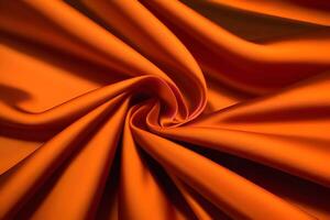 Vibrant Orange Silk Fabric Drape Luxurious Texture and Rich Color photo