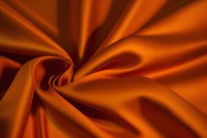 Luxurious Orange Silk Fabric Drape Abstract Texture and Smooth Waves photo