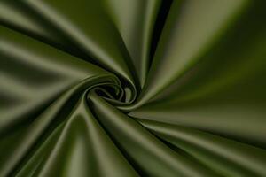 Olive Green Satin Fabric Draped Swirl Texture Background photo