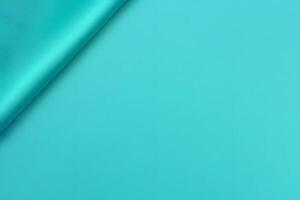 Abstract Teal Fabric Fold A Study in Texture and Light photo