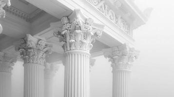 A white building with columns and pillars in the fog photo