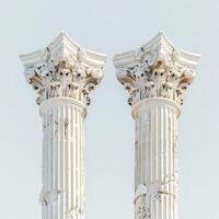 Two columns with white marble on top photo