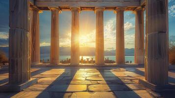 The sun is setting behind the columns of an ancient greek temple photo