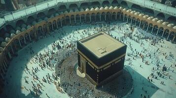 Nighttime Majesty of the Kaaba Surrounded by Tower Radiance photo