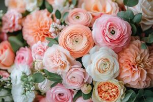 A close up of a bouquet of pink and orange flowers photo