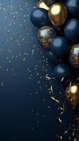 Gold and blue balloons on a dark background with confetti photo