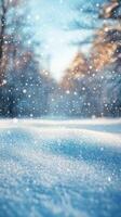 Snow falling on a snowy forest background photo