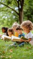 Group of children reading books in the park photo