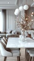 A dining room with white marble table and chairs photo