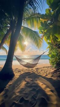 Hammock on the beach with palm trees photo