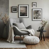 A gray chair and a vase of flowers in a room photo