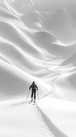 A person is skiing down a snowy mountain photo