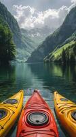 Three kayaks are sitting on the water in front of a mountain photo