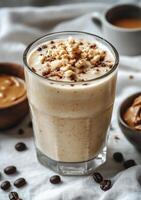 A smoothie with peanut butter and coffee beans photo
