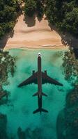 Aerial view of a plane landing on a beach photo