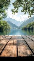 Wooden deck overlooking a lake and mountains photo