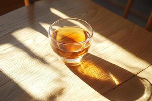 A glass of tea on a table photo