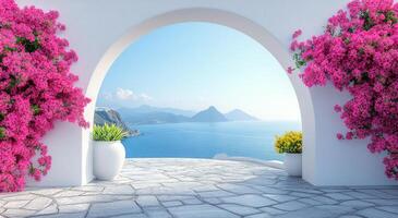 A white archway with pink flowers and a view of the ocean photo