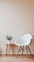 White chair and table in a room with a wall photo