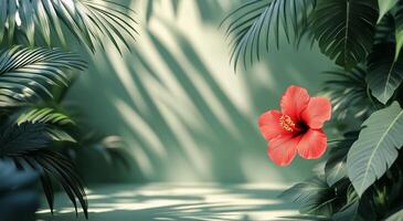 Tropical background with red flower and green leaves photo