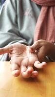 Exploring reflexology techniques for relaxation in a cozy cafe setting video