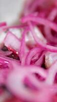 beet salad. Shuba salad with herring red pickled onion beetroot herring on potato slices video