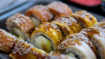 sushi boat platter with assorted sushi rolls and sashimi video