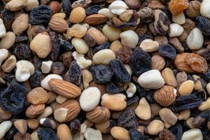A close up of nuts and dried fruit photo