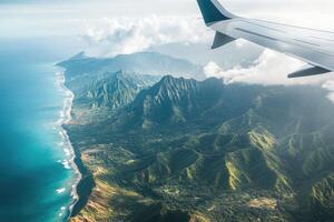A view of the ocean and mountains from an airplane photo